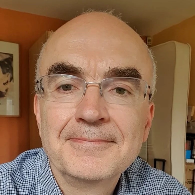 Man smiling with glasses on